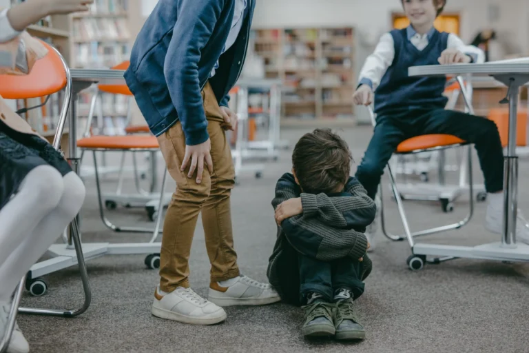 Child sulking in classroom